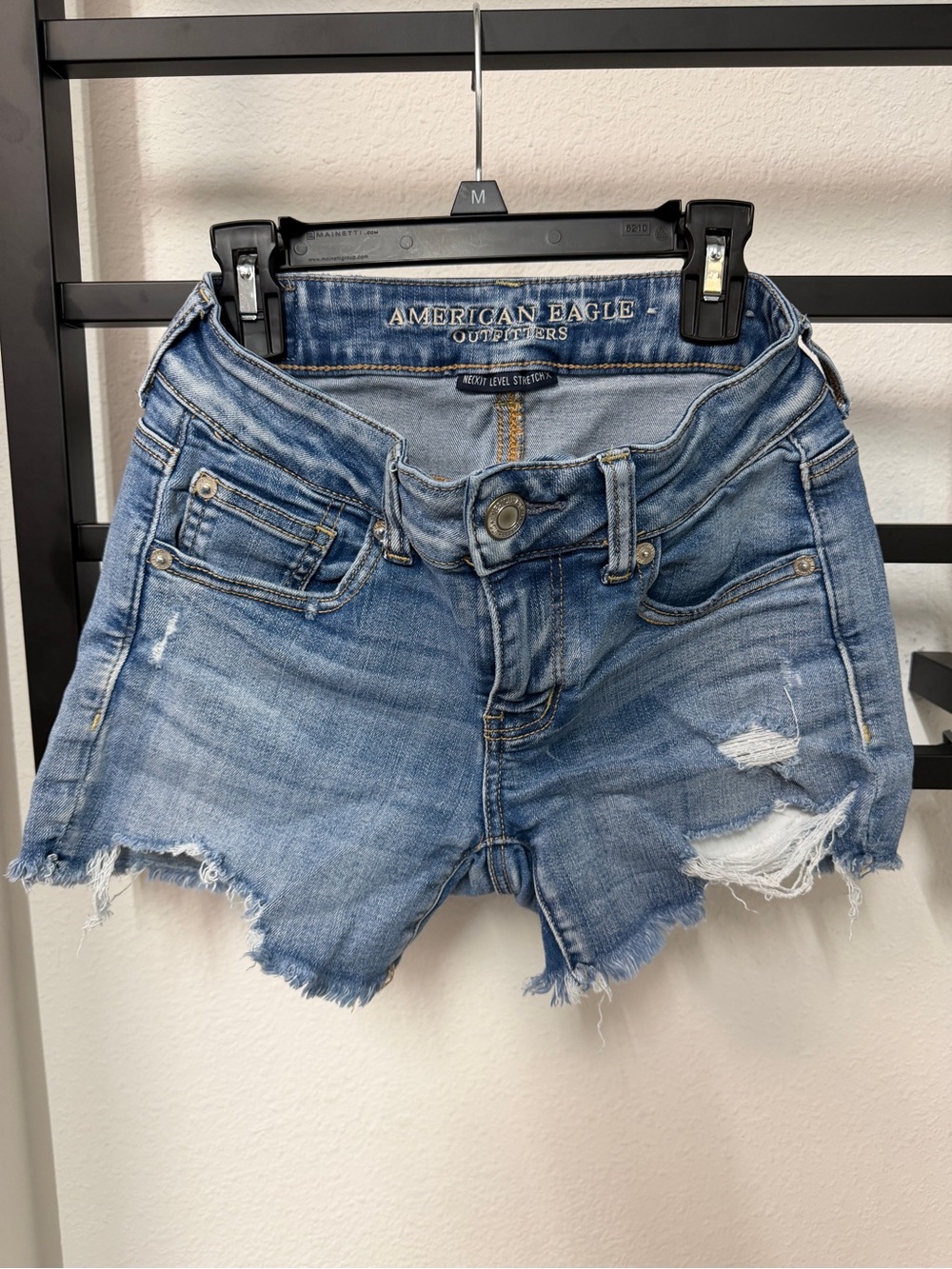 American Eagle Outfitters light blue distressed denim cutoff shorts sz 2